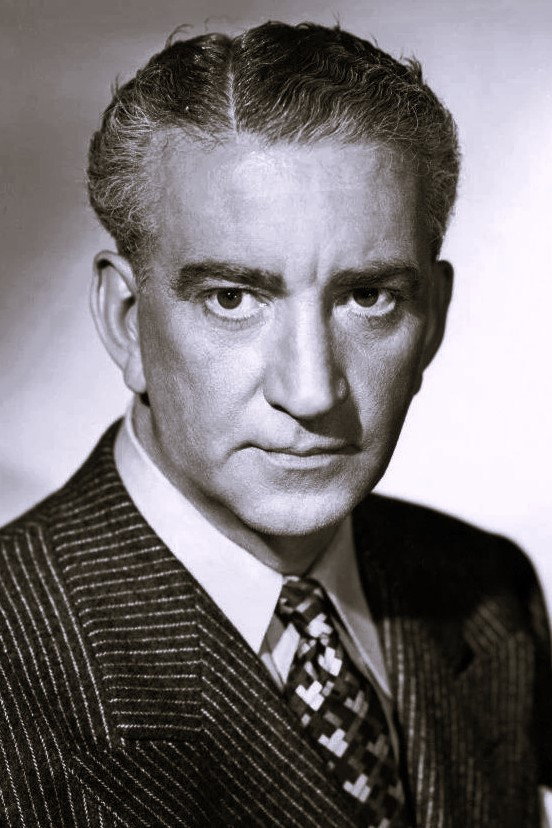 John Litel as Post in A Slight Case of Murder