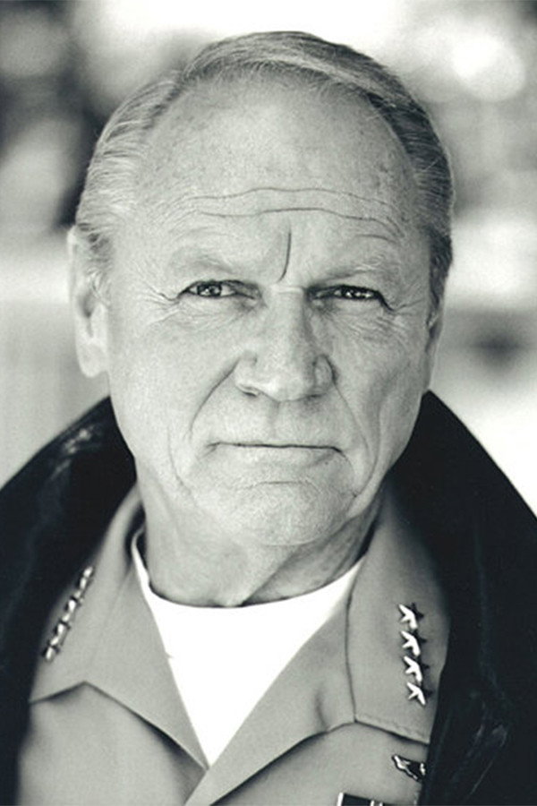 Conrad Bachmann as Roy in Roach Motel