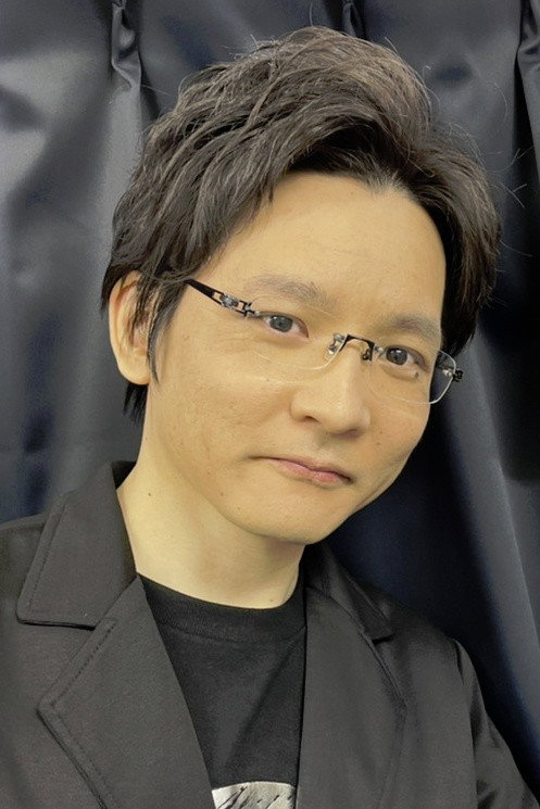 川原元幸 as Kazuomi Hirasawa (voice) in Eden of the East