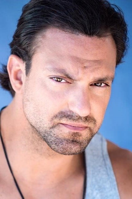 Aaron Haddad as Assassin in The Oath