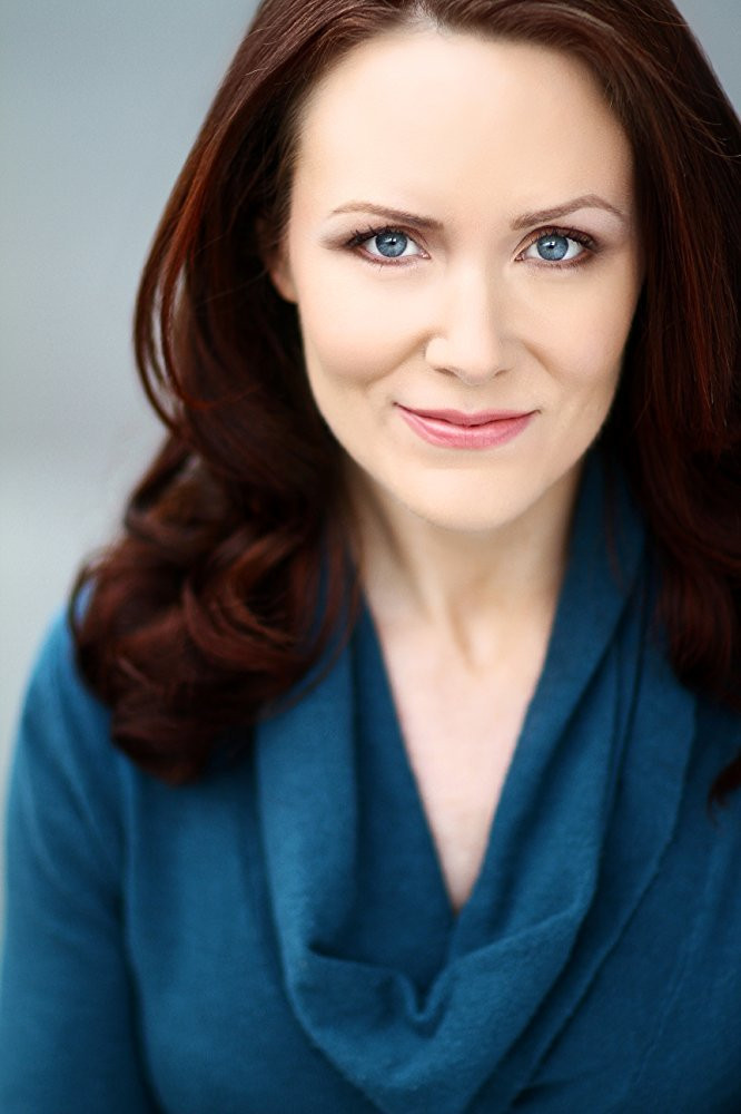 Jenn MacLean-Angus as Katrin Villenueve in Reluctant Witness