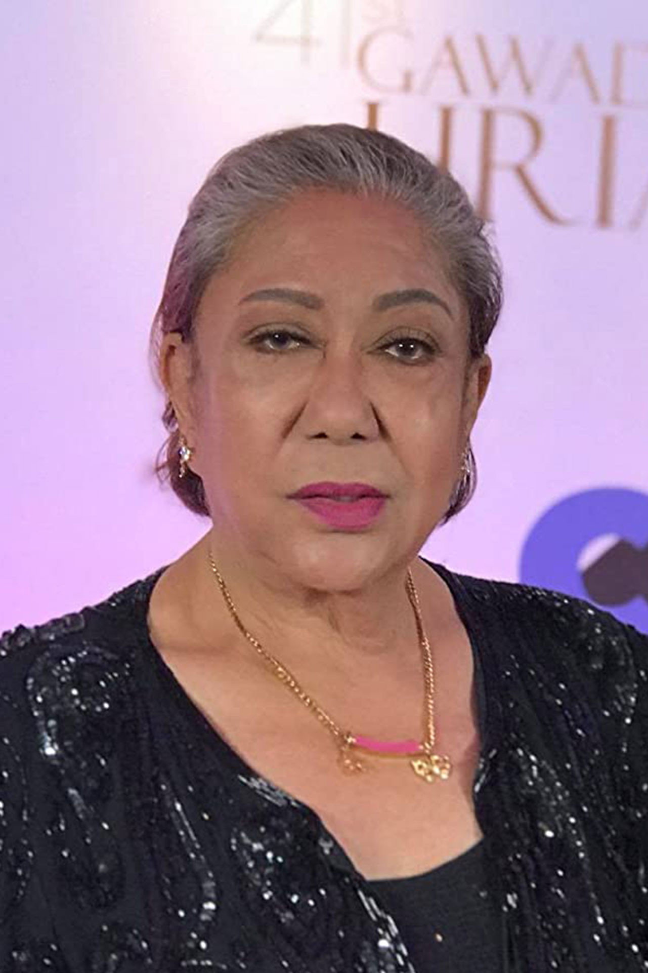 Odette Khan as Aunt Ason in Muli