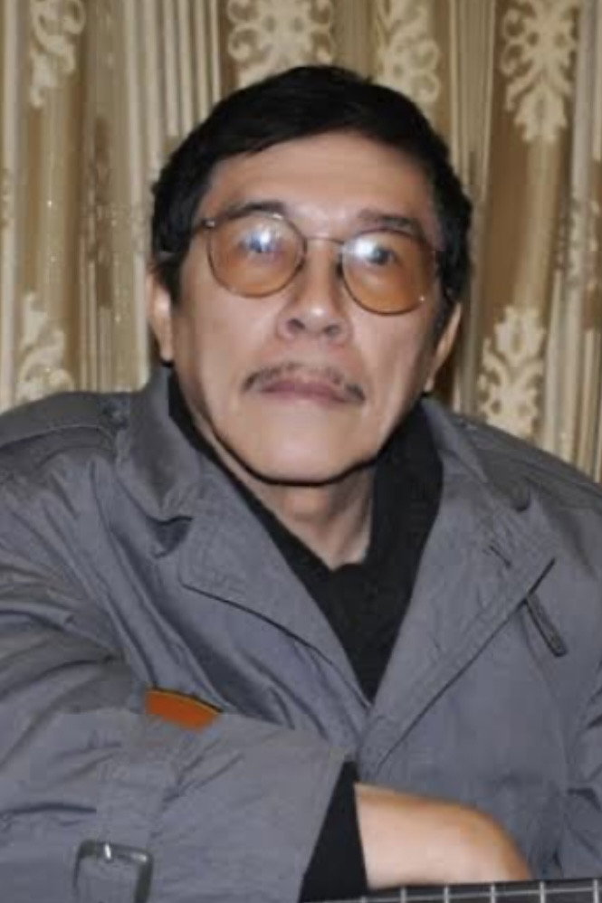 Vũ Ngọc Quang as Văn Minh (Mr. Civilized) in Dumb Luck