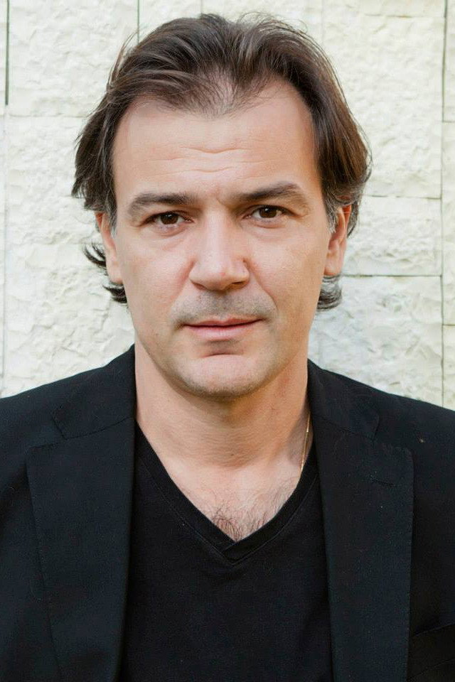 Genti Kame as Adrian in Passo a due