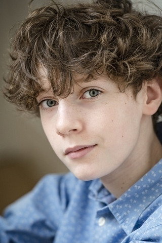 Maxim Driesen as Georges Balland, aka 'Kid', at 13 in Les Cowboys