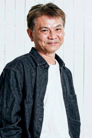 吉田友紀 as Tomita in Mikadroid: Robokill Beneath Disco Club Layla
