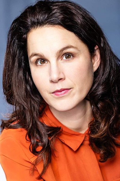 Mel Marginet as Dr. Okeyo in First Person Shooter