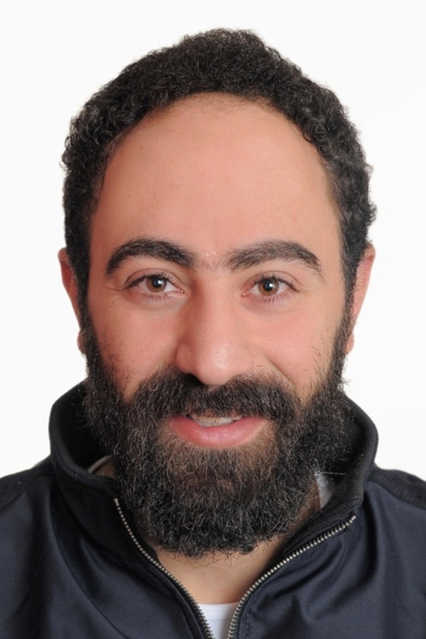 Is'haq Elias as The Director in Once Upon a Time in Gaza