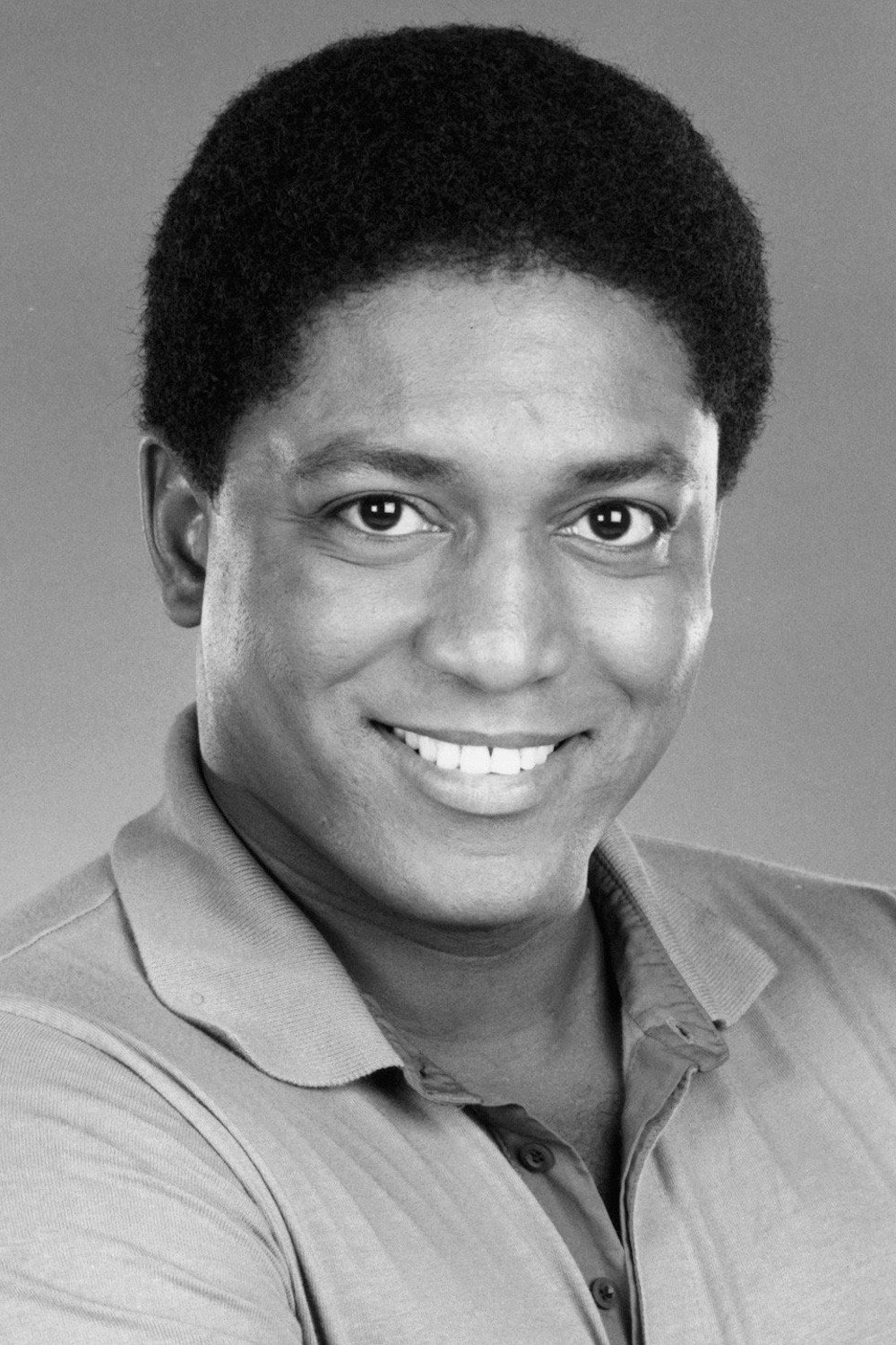 Larry Riley as Herman Bell in Badge of the Assassin