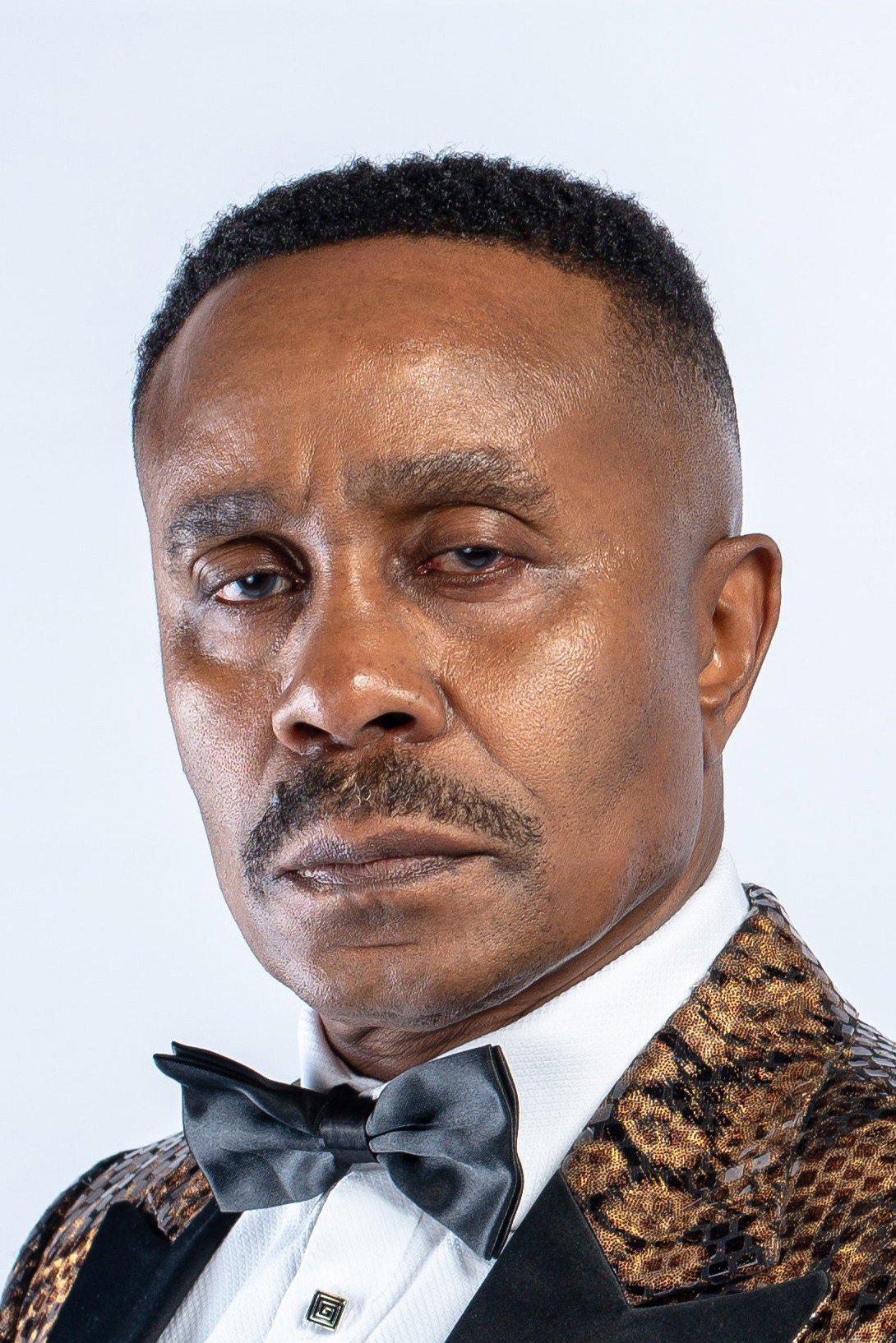 Vusi Kunene as Mazambane in Fools