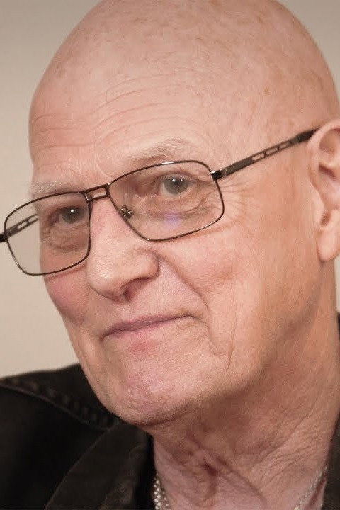 Chris Slade as Self in AC/DC - Plug Me In