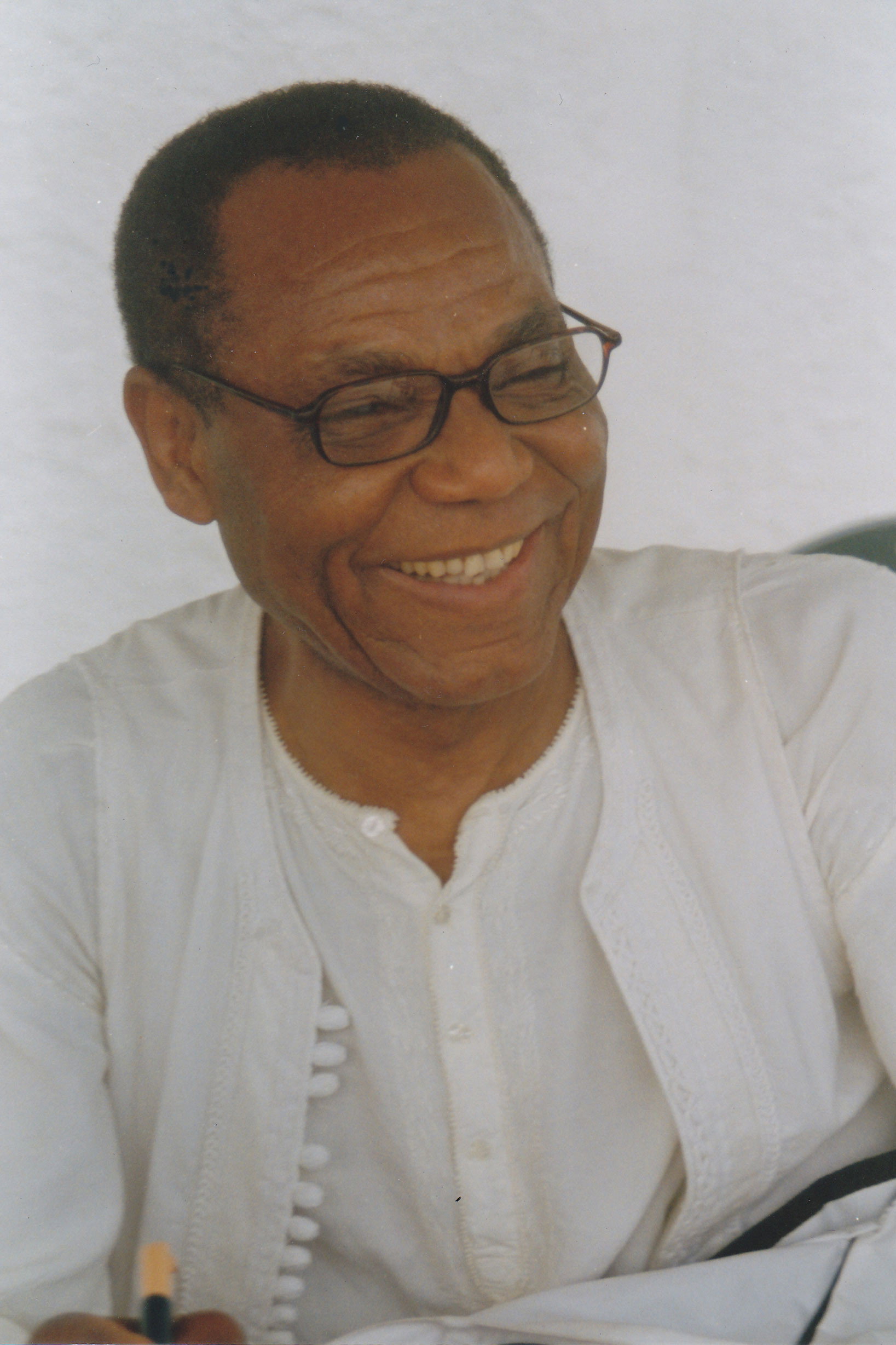 Daniel Kamwa as Raymond in Spike