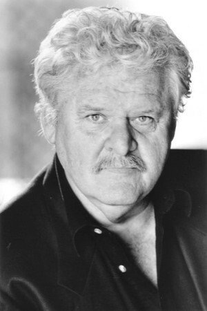 Dion Anderson as Editor in Incident at Dark River