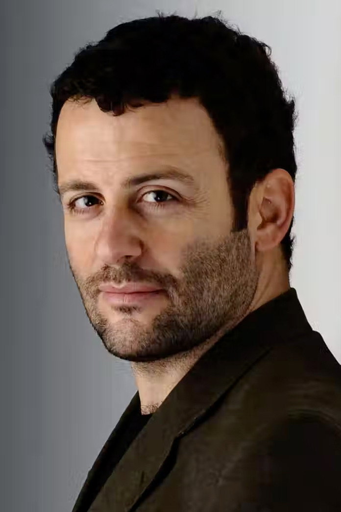 Erdil Yaşaroğlu as Professor Günhan in Three Thousand Years of Longing