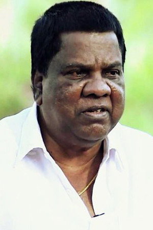 Mala Aravindan as Kesavan in Thappana