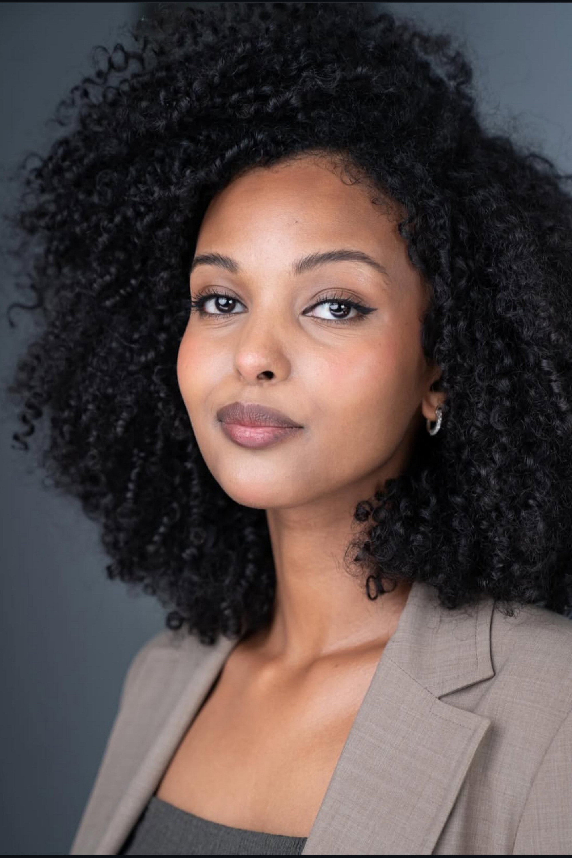 Sofia Tesema as Lipstick Woman in Locked