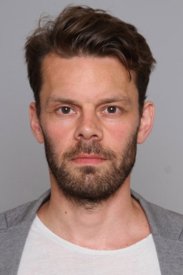 Björn Thors as Arnar in The Valhalla Murders