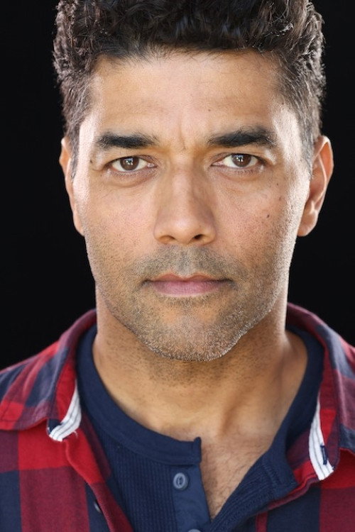 Barry Newell as Police Officer Torres in CHORUS