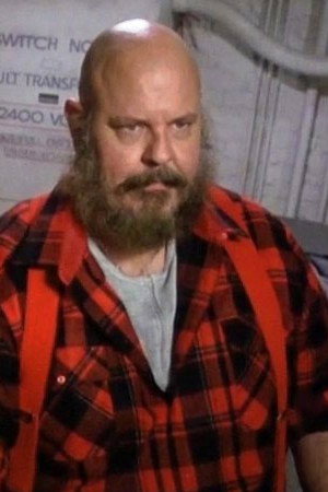 Darwyn Swalve as Gun Dealer in Take Two