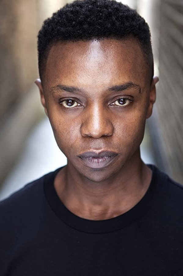 Charles Mnene as Sam in New Town Killers