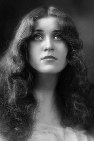 Ruby Miller as Mrs. Laura Rodman in Double Exposures