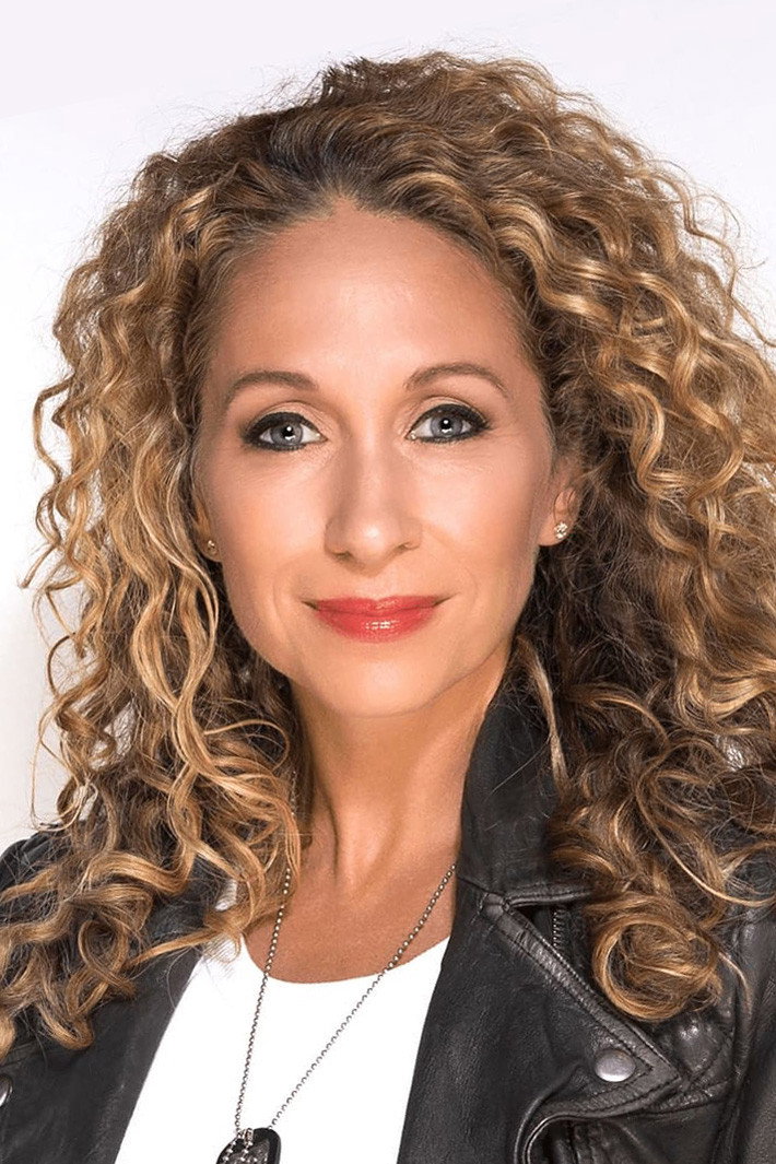 Katie Daryl as Self - Host in The Top Ten Revealed
