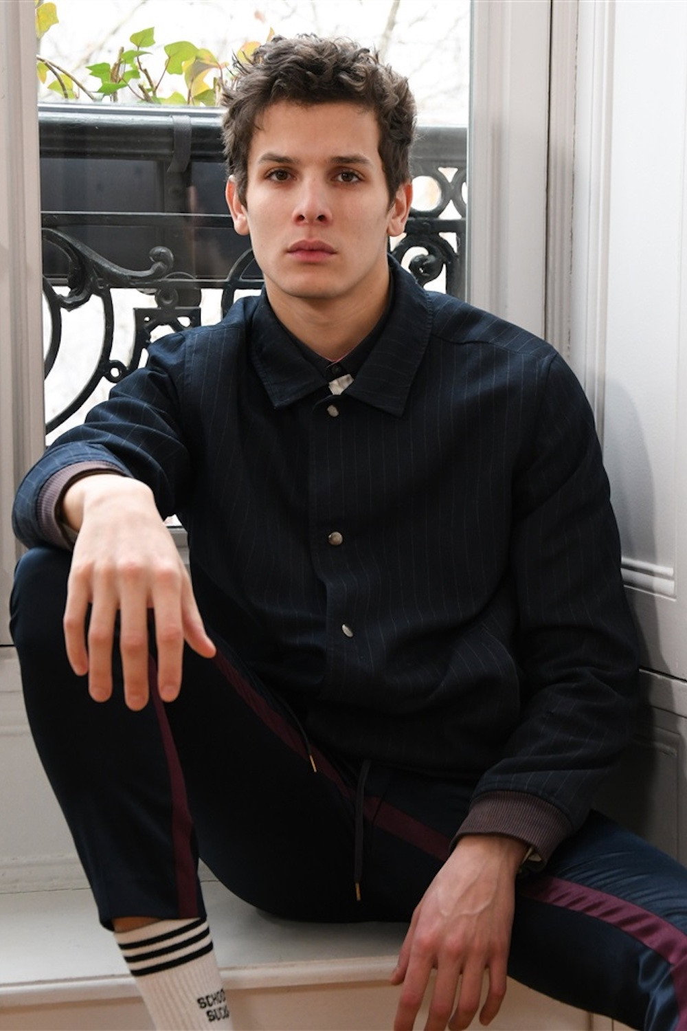 Noham Edje as Adrien Lacaze in The Edge of the Blade