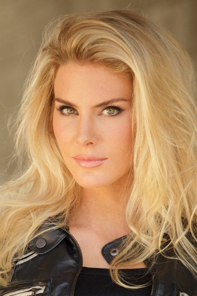 Kelly Greyson as Gia in MR-9: Do or Die