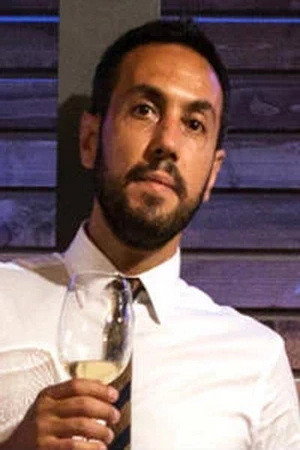 Roberto Fara as Roberto in A Fistful of Grapes