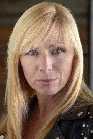 Carolyn Adair as Wedding sales clerk in My Best Friend's Bouquet