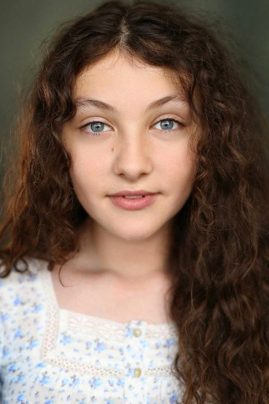 Chloe Raphael as Betty in The Groomsmen: Last Dance