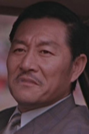 黃宗迅 as Wang (Uncle Lo) in Freedom Strikes a Blow