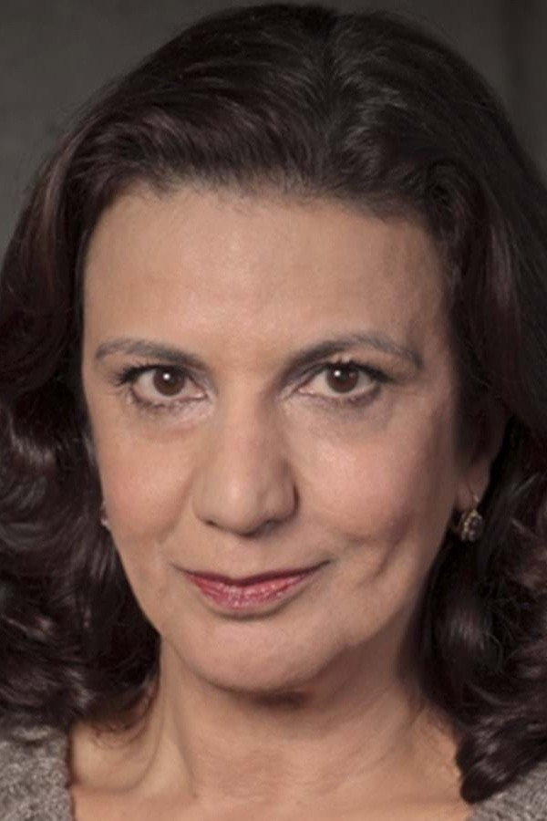 Teresa Gafeira as Rosa Maria in Quando os Lobos Uivam