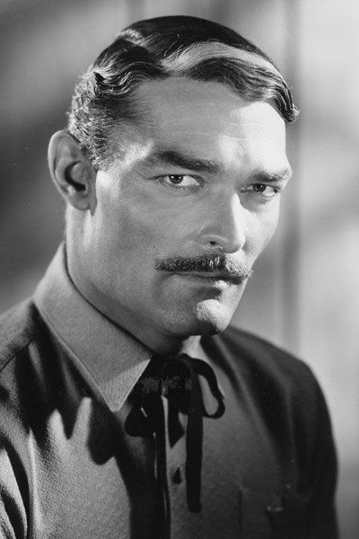 John Russell as Hugh Clagg in Man in the Saddle