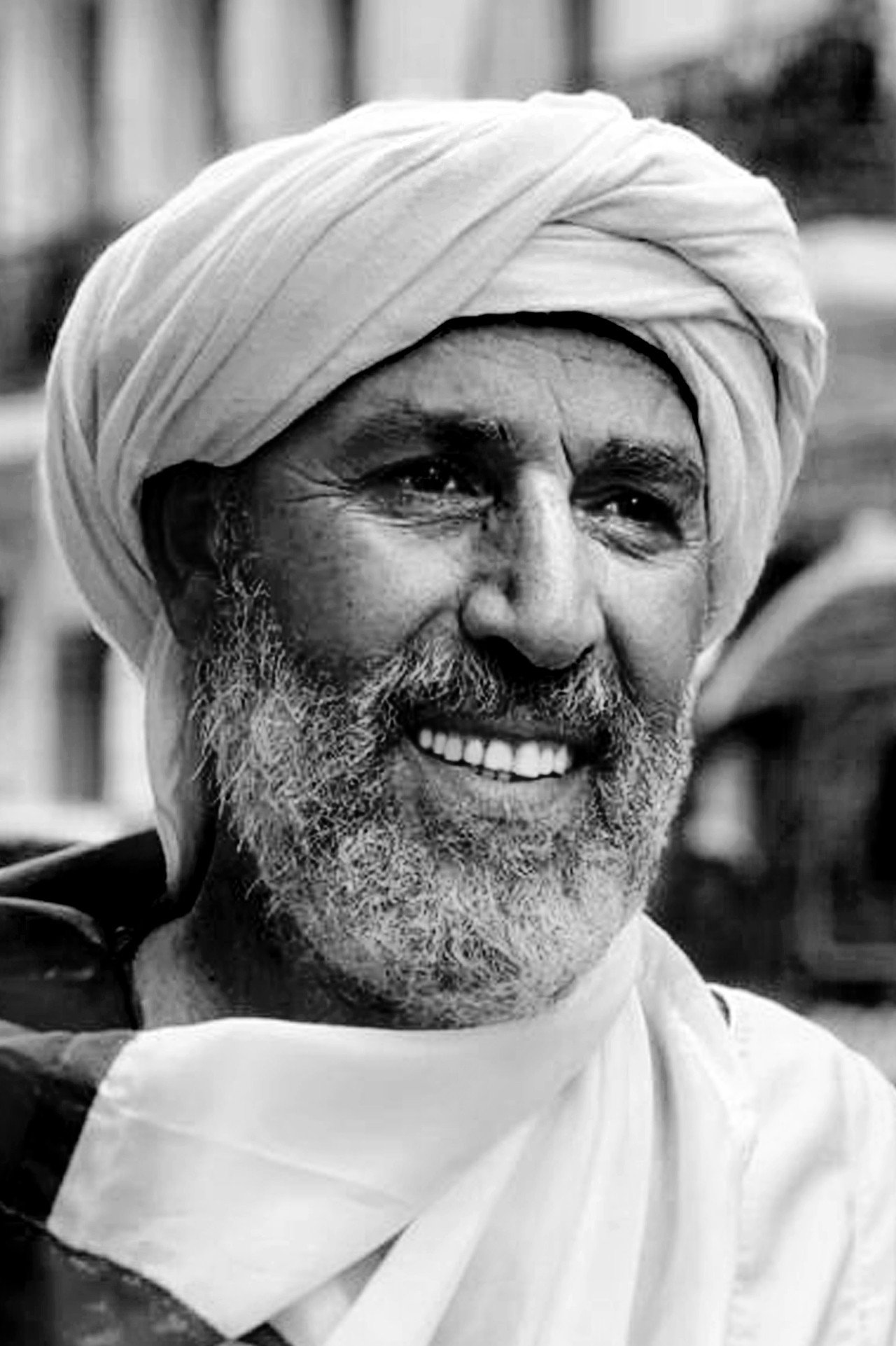 Lakhder Boukhers as Lakhder in Gourbi Palace