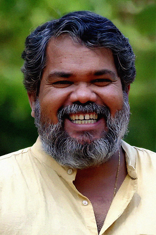 Zhinz Shan as Susheelan Vava in Aavasavyuham: The Arbit Documentation of an Amphibian Hunt