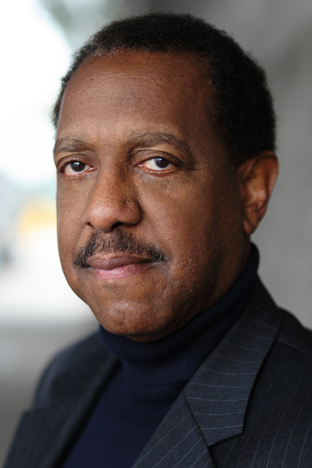 Michael D. Roberts as Mr. Arrechia in Double Trouble