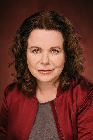 Verena Berger as Evelyn in Aspach