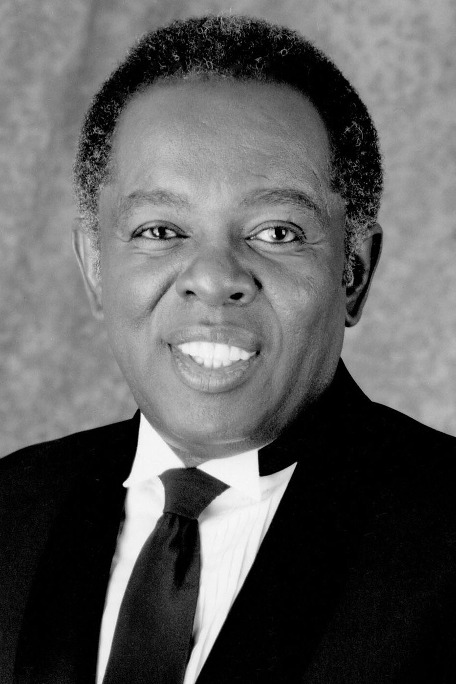 Lou Rawls as Rev. Luke Thomas in Malevolence