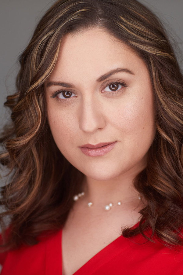 Courtney Elvira as Laura in The Godfathers