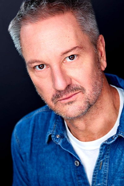 J. Tucker Smith as Tom Travis in Carriers