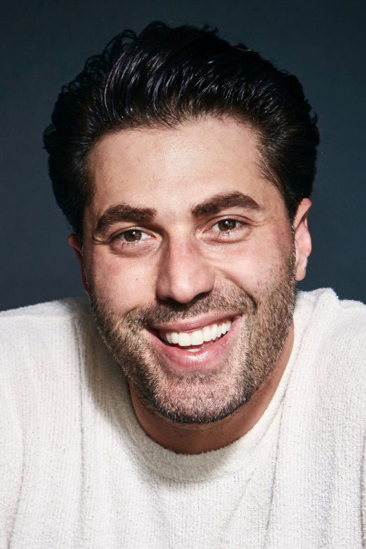 Adam Ray as Dr. Phil in Dr Phil LIVE!