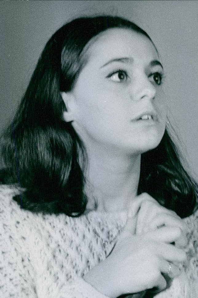 Evelyne Valentino as Louisette in La Queue du Diable