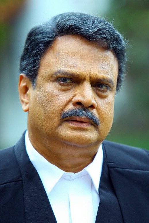 Prem Prakash as Puthenpurayil Augustine in Enthada Saji