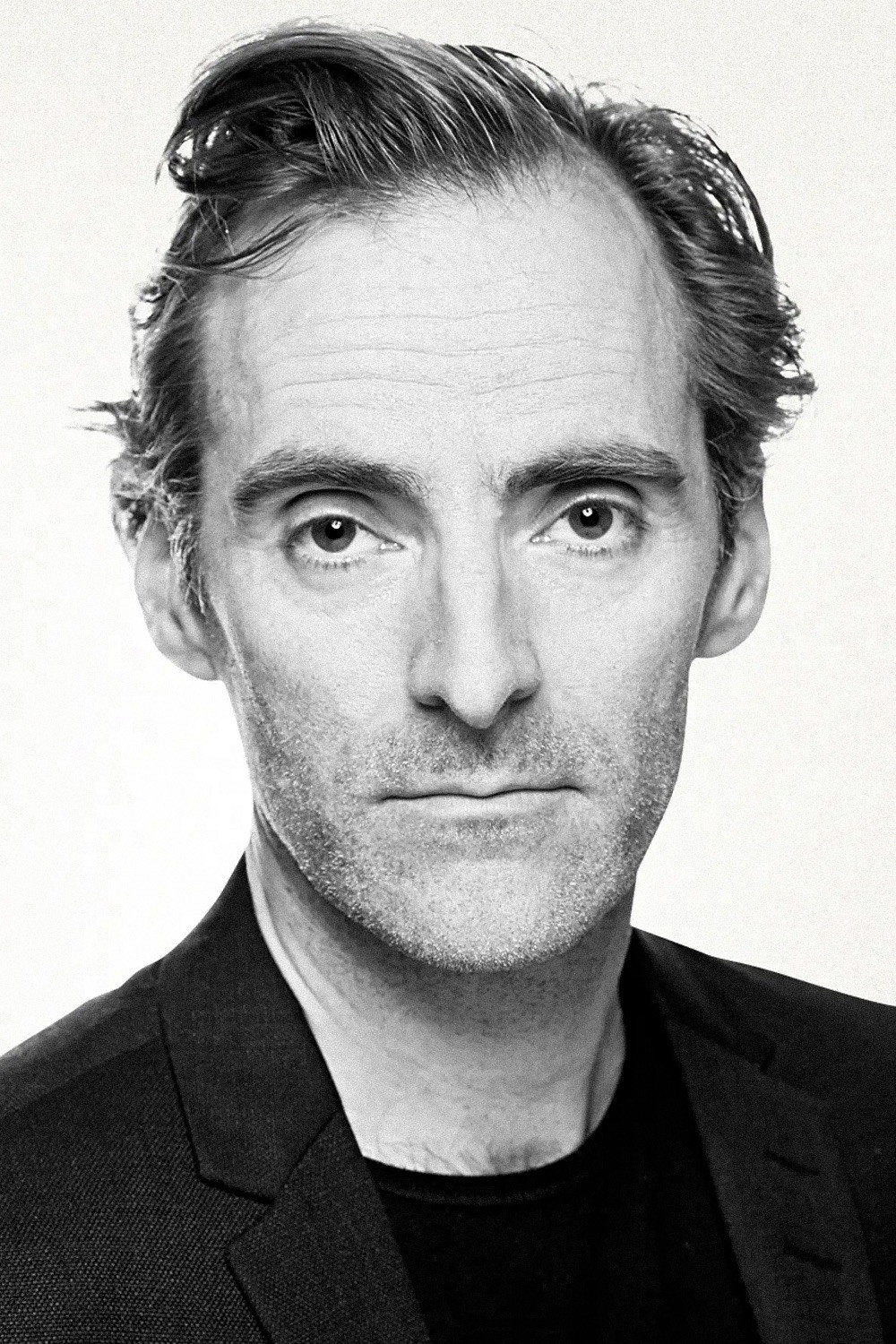Erland Bakker as Sverre Lie in Folkevalgt