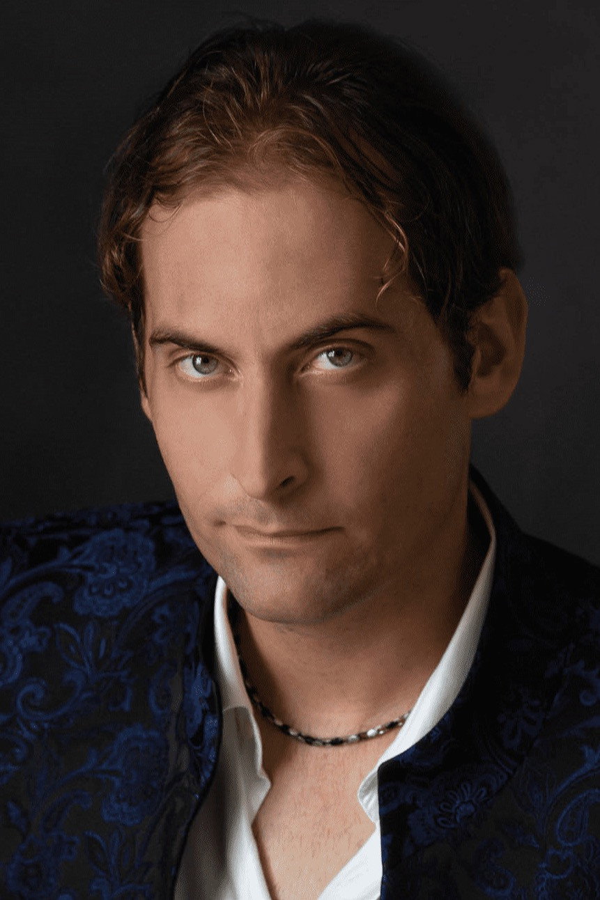 Federico Carro as Writer in The King of Light the Order of the Dark Gods