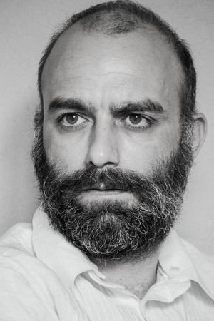 Roberto Salemi as Benito Caputo in Anti-Mafia Squad