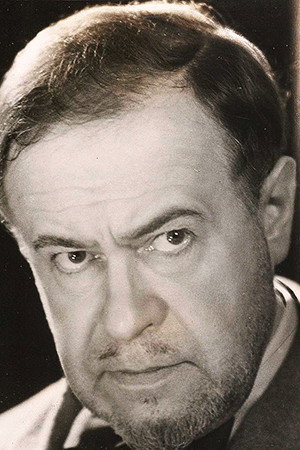 Roger Karl as John Wills in L’Or