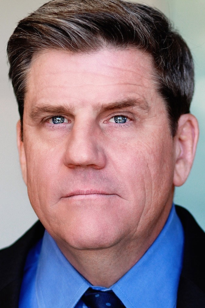 Rod McLachlan as Justice Guard in Conspiracy Theory