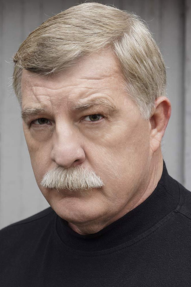 Richard Fike as Police Officer #2 in The Charnel House